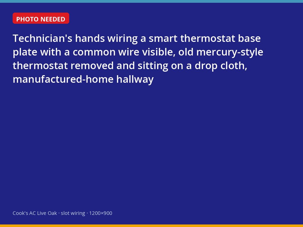 Technician wiring a smart thermostat base with a common wire in a manufactured home
